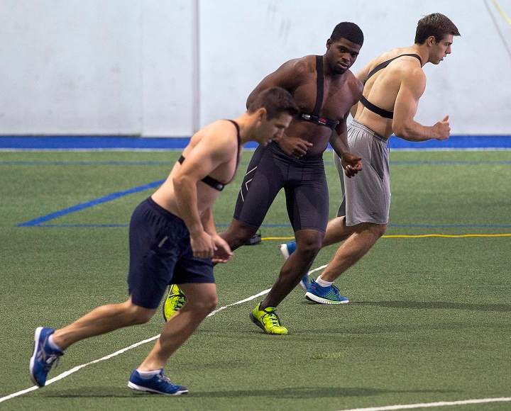 Montreal Canadiens defenceman P. K. Subban, centre, runs with teammates as the team reports for medicals on the first full day of training camp Thursday, September 18, 2014 in Brossard, Que.