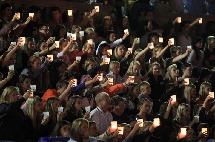 Students, teachers and parents raise their candles in support of missing U.Va. student Hannah Elizabeth during a student led vigil Thursday night, Sept. 18, 2014, at the University of Virginia in Charlottesville, Va. Graham was last seen early Saturday morning Sept. 13, 2014.