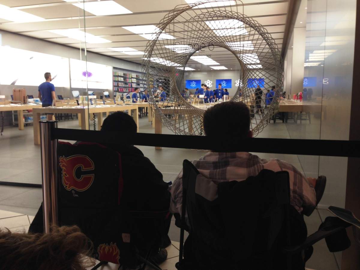 Eager Apple fans lineup outside of the Chinook Centre location ahead of the iPhone 6 release on Friday, September 19, 2014.