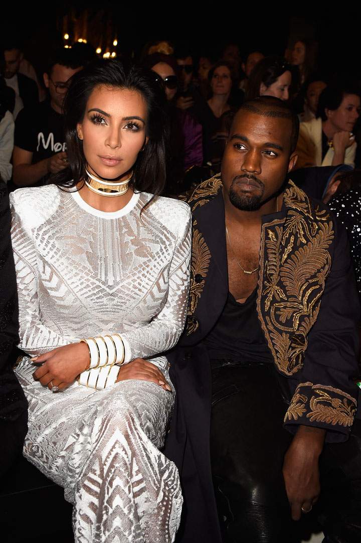 Kim Kardashian and Kanye West attend the Balmain show as part of the Paris Fashion Week Womenswear Spring/Summer 2015 on September 25, 2014 in Paris, France.