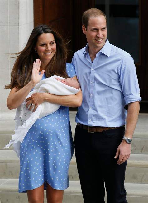 Kate Middleton and Prince William both wore blue when they brought out their firstborn, Prince George, to throngs of awaiting fans.