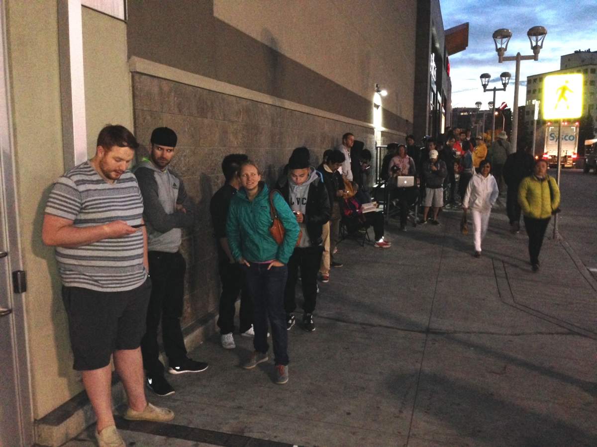 Eager Apple fans lineup outside of the Chinook Centre location ahead of the iPhone 6 release on Friday, September 19, 2014.