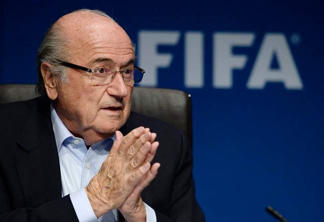 FIFA president Joseph Sepp Blatter listens to journalist's questions at a press conference following a FIFA Executive Committee meeting, on Friday, Sept.26, 2014, at the FIFA headquarters in Zurich, Switzerland.