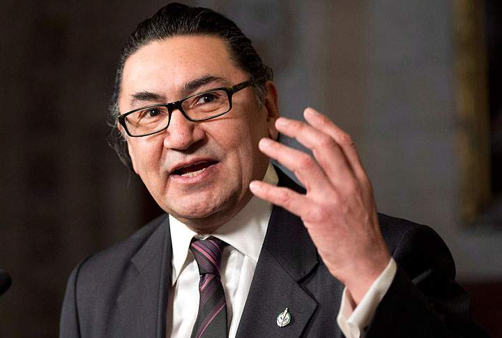 NDP MP Romeo Saganash speaks with the media in the Foyer of the House of Commons on Parliament Hill Monday January 28, 2013, in Ottawa.