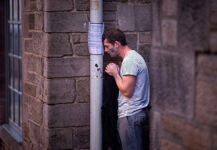 A lone YES campaign supporter stands in an alleyway in Edinburgh after the result of the Scottish independence referendum, Scotland, Friday, Sept. 19, 2014.