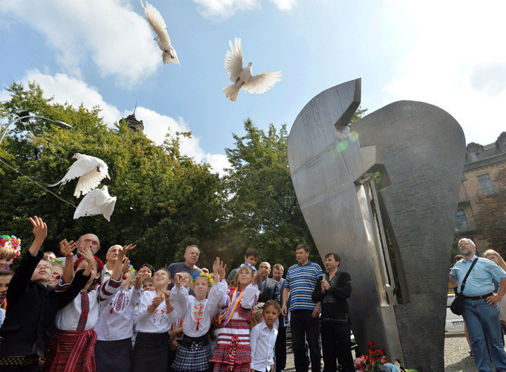 Children release white doves in front of a monument for victims of terrorists in Kiev on September 11, 2014 during a commemoration ceremony. (Photo credit. (Photo credit: Genya Savilov/AFP/Getty Images)