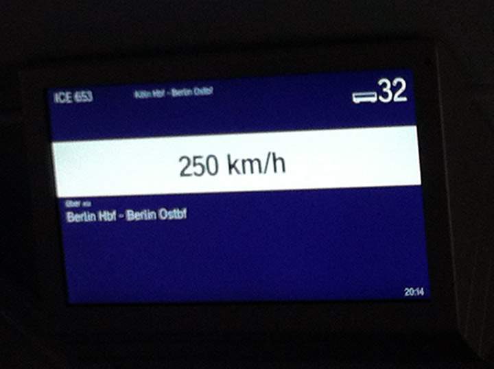 A screen shows that the train has reached 250 km/h
