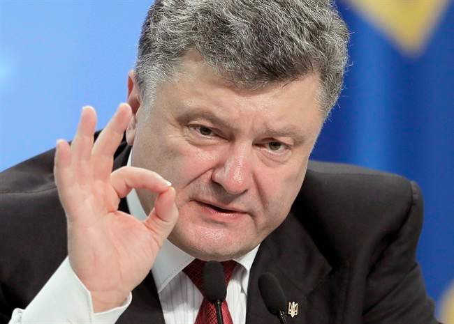 Ukrainian President Petro Poroshenko gestures in Kiev on Thursday, Sept. 25, 2014.