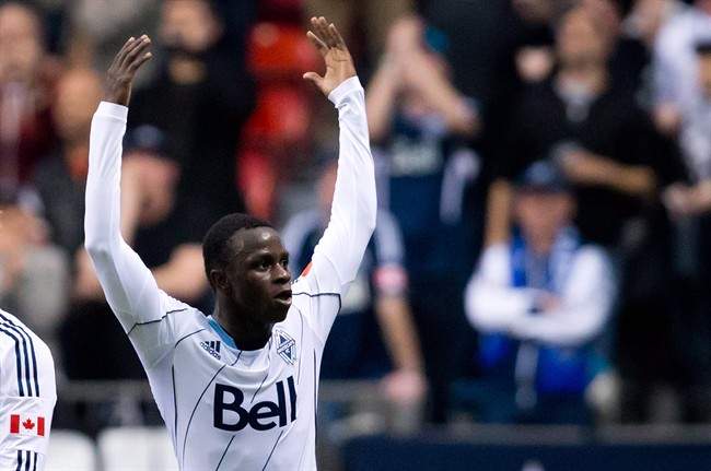 Vancouver Whitecaps' Kekuta Manneh, of Gambia, celebrates.