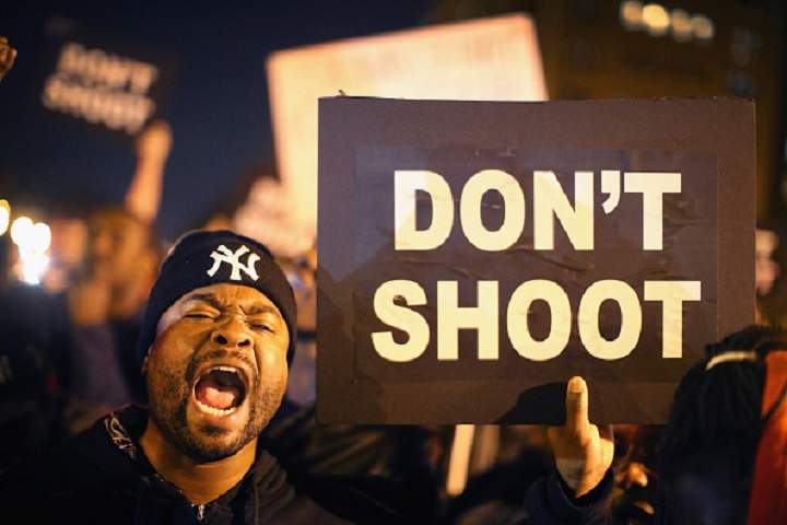 Demonstrators march through the streets protesting the October 8 killing of 18-year-old Vonderrit Myers Jr. by an off duty St. Louis police officer on October 9, 2014 in St Louis, Missouri. The St. Louis area has been struggling to heal since riots erupted in suburban Ferguson, Missouri after the shooting death of 18-year-old Michael Brown by a Ferguson police officer on August 9.