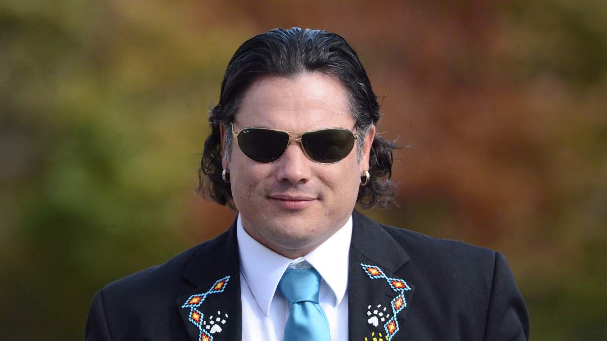Senator Patrick Brazeau arrives at the Senate in Ottawa on Oct. 22, 2013. THE CANADIAN PRESS/Sean Kilpatrick.