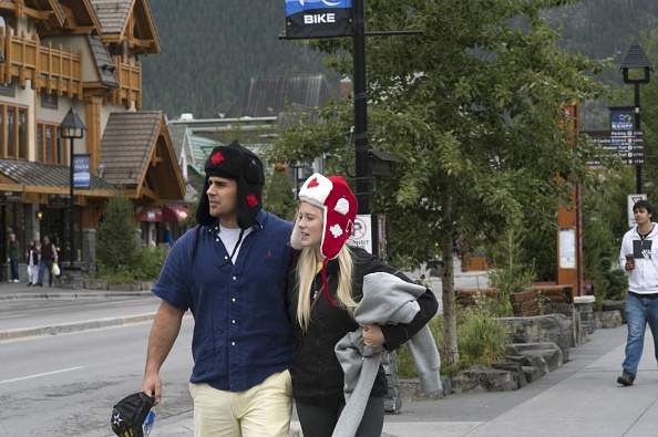BANFF, AB - SEPTEMBER 3: Tourists on Banff Ave. on September 3, 2014 in Banff, Canada. (Photo by Santi Visalli/Getty Images)