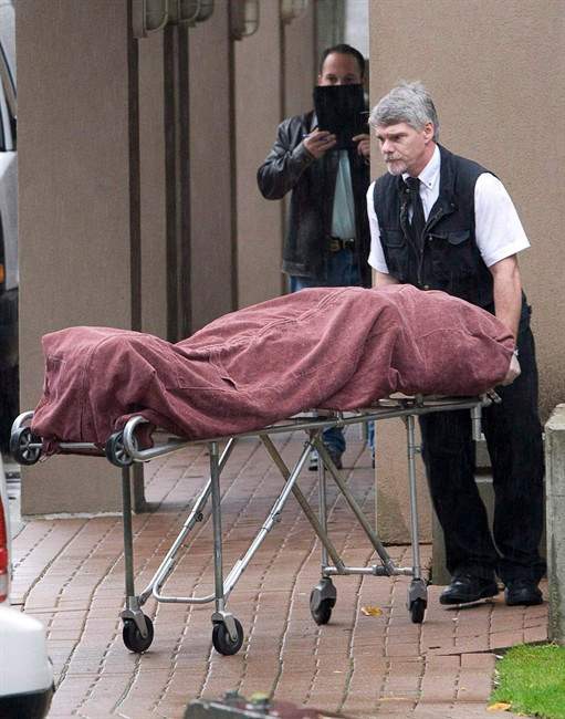 A worker loads a body into a van following a multiple homicide in Surrey, B.C. Sunday, Oct. 21, 2007, as six people were found dead in an apartment building. It was a shocking gangland crime that could rightfully be called a bloodbath: six men murdered, execution-style, two of them innocent bystanders who happened to be in the wrong place.Two of the men accused in what's come to be known as the "Surrey Six" slayings. THE CANADIAN PRESS/Jonathan Hayward.