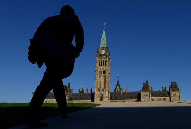 A man walks on Parliament Hill on September 15, 2014.