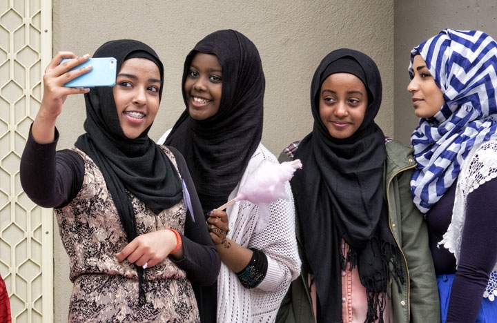 Girls take a selfie during National Mosque open day at the Werribee Islamic Centre in the suburb of Hoppers Crossing on October 25, 2014 in Melbourne, Australia.