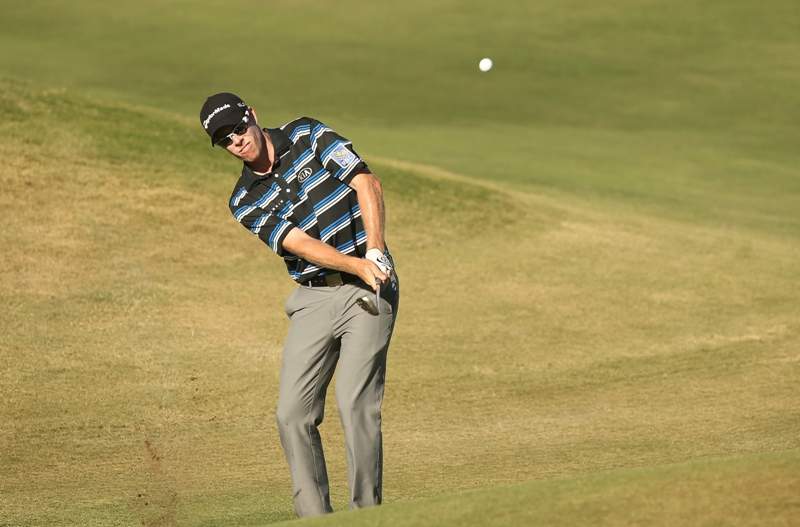  David Hearn of Canada chips onto the green on the 15th hole during the final round of the Shriners Hospitals For Children Open at TPC Summerlin on October 19, 2014 in Las Vegas, Nevada. (Photo by Darren Carroll/Getty Images).