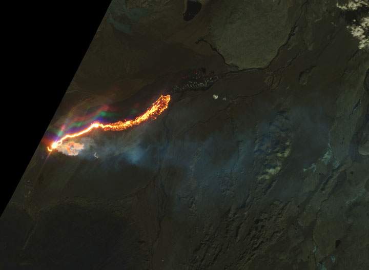 A false-color image, based on satellite observations in the infrared was taken on Sept. 20. Hot lava glows orange-red, fading to black as it cools.