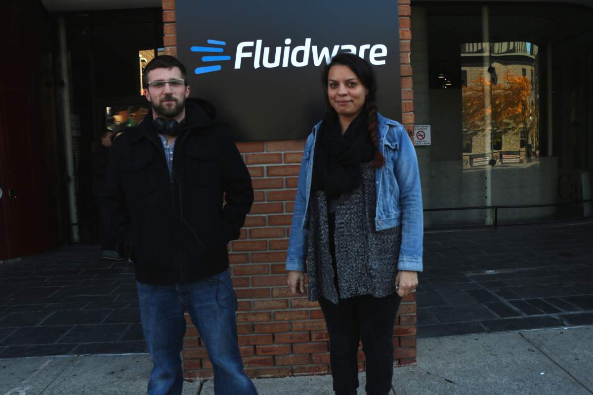 Chris Cusson and Celina Levesque work at Fluidware on York Street in downtown Ottawa.