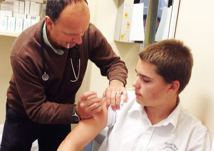 Dr. Yaremko vaccinates a 15-year-old against Meningitis Type B on October 6, 2014.