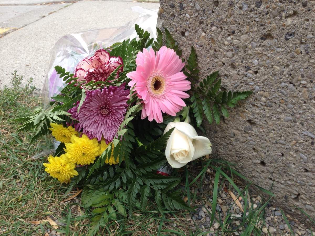 Flowers left at Mewata Armoury in Calgary after the Ottawa shooting
