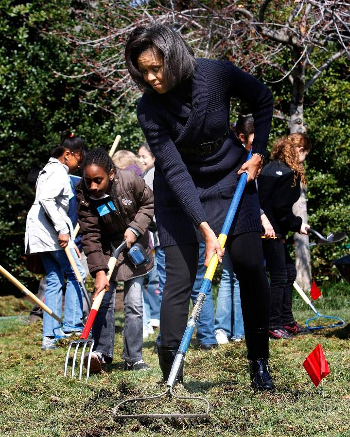 Michelle Obama takes part in the groundbreaking of the White House Kitchen Garden on the South Lawn of the White House in Washington with students from Washington’s Bancroft Elementary School.