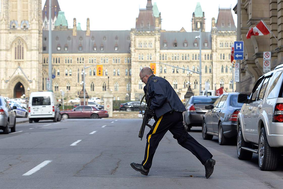 Police secure an area around Parliament Hill in Ottawa on Wednesday Oct.22, 2014.