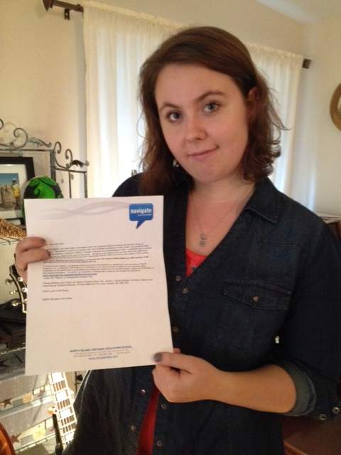 Alannah Clark and her scholarship letter.