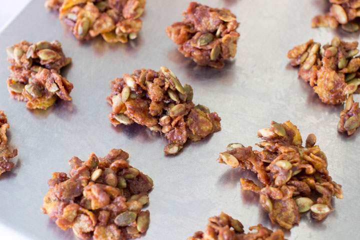 This Sept. 22, 2014 photo shows spicy sweet mole pumpkin seed clusters in Concord, N.H. The granola-like snack takes a more balanced approach to our Halloween sugar rush.
