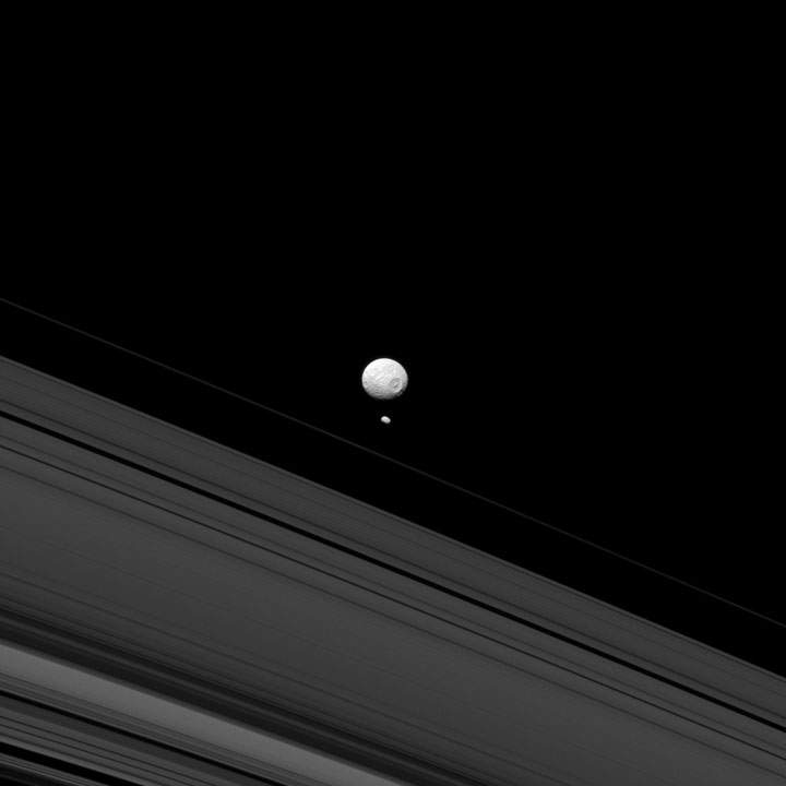 “That’s no moon; it’s a space station.” Okay, it’s a moon. Mimas — resembling the Death Star seen in ‘Star Wars’ — and Phoebe lie in space with the rings of Saturn in the foreground.