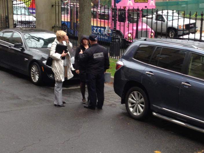 Security officials meet with MLAs as the arrive at they Nova Scotia legislature on Oct. 22, 2014.