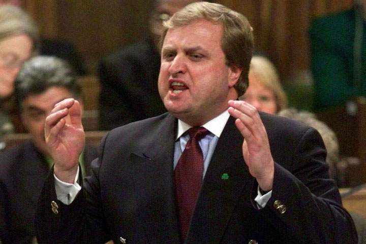 In this FILE photo, Sergio Marchi questions the Reform Party's patriotism in response to a question in the House of Commons in Ottawa Wednesday March 17, 1999.