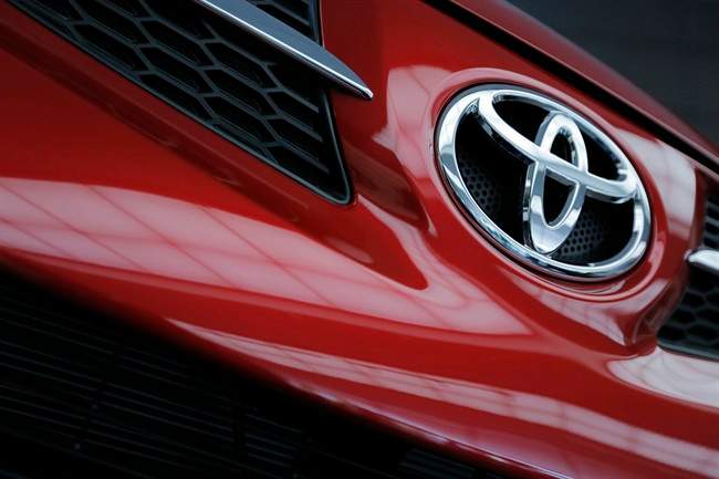 In this Wednesday, May 8, 2013 file photo, a Toyota Motor Corp.,'s model is on display at the automaker's Tokyo head office in Tokyo.