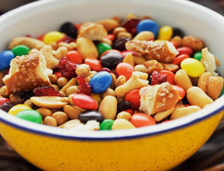 Are you grazing away on pre-packaged trail mix, granola bars, and other seemingly healthy snacks because they’re good for you? New research is warning that food with “fitness branding” may be misleading consumers into eating more and exercising less.