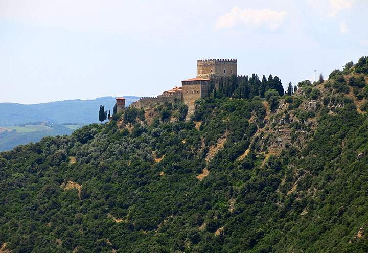 This June 11, 2014 photo shows the castle of Ripa d’Orcia, a medieval castle that is now offers bed-and-breakfast accommodations in Tuscany, Italy. Walking tours of Tuscany offer many scenic and historic spots like this one.