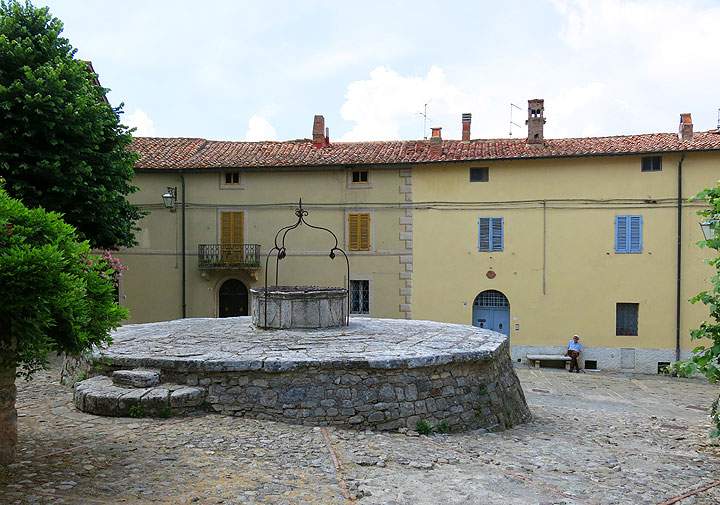 This June 11, 2014 photo shows an ancient stone cistern in Rocca d’Orchia, a village in Tuscany, Italy, known for a stone fortress on a hill. Walking tours of Tuscany offer many scenic and historic spots like this one.