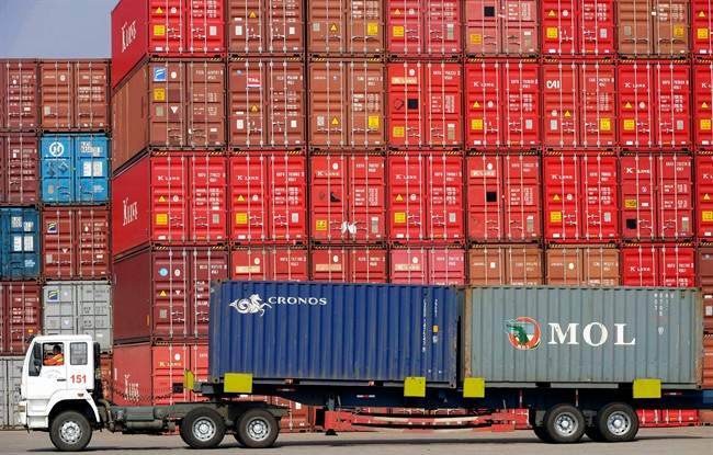 The Pacific Maritime Association said Thursday that the union isn't dispatching enough workers at the twin ports of Los Angeles and Long Beach to load containers efficiently onto trucks and trains. On Monday, the association said crane operators with the International Longshore and Warehouse Union in Washington state are moving cargo at half-speed.