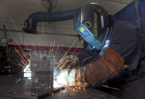 Welder Errol Wright builds brackets to support solar panels at the Samco Solar facility in Toronto, Ontario, Canada on Wednesday, Sept. 28, 2011.