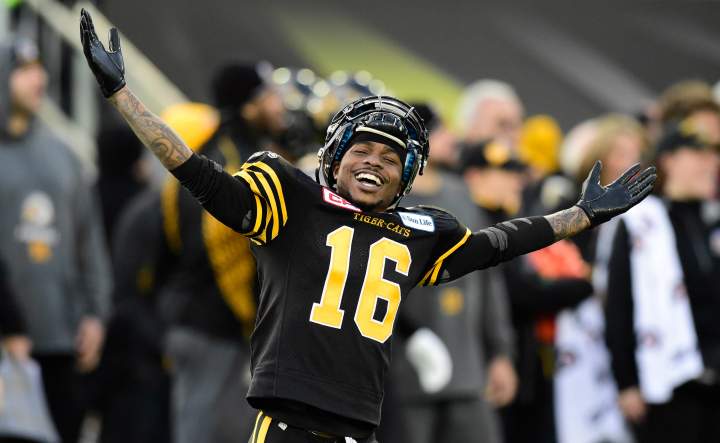 Hamilton Tiger-Cats wide receiver Brandon Banks celebrates on the sidelines during second half action against the Montreal Alouettes in the CFL Eastern Division final in Hamilton, Ont., on Sunday, Nov. 23, 2014.