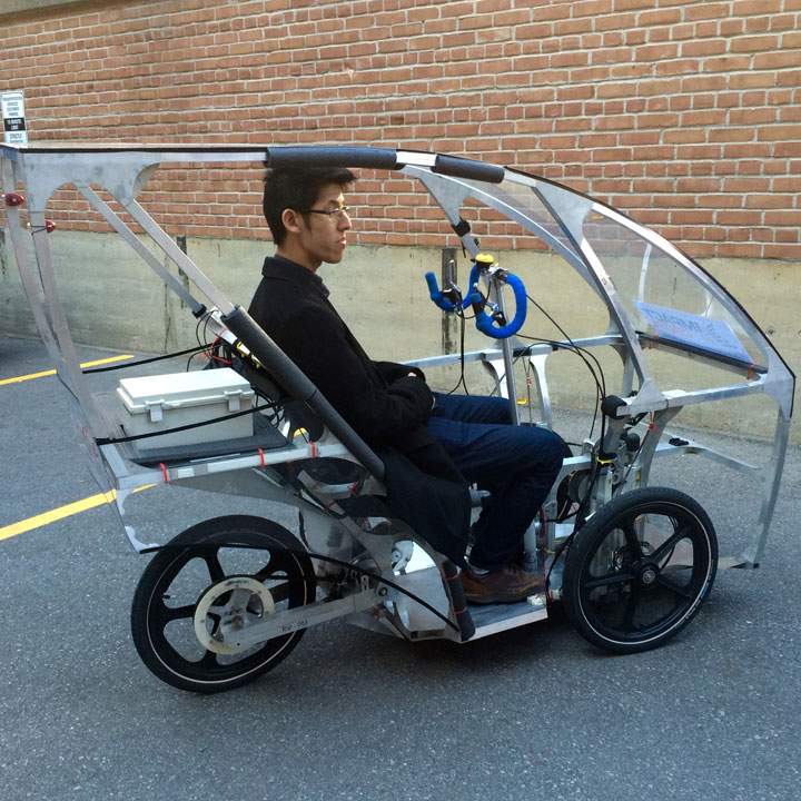 Jonathan Lung, one of the founders of Sojourn Labs, takes the car-bike for a spin. (File/Global News)
