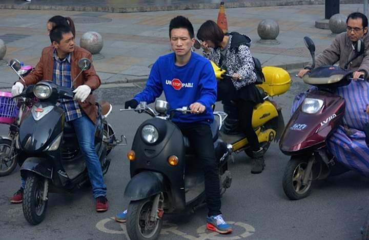 Electric scooters are a very popular means of getting around in Chengdu, China.