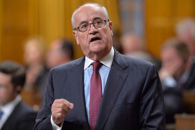 Veterans Affairs Minister Julian Fantino answers a question during Question Period in the House of Commons on Parliament Hill in Ottawa, Thursday Sept.18, 2014 . Fantino says the department's $1.1 billion dollars in unused funding over seven years is "not lost money.".