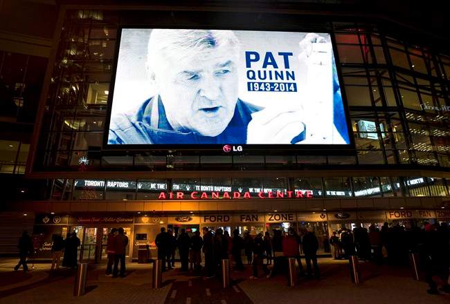 A tribute to late hockey player and coach Pat Quinn is displayed on a video screen at the Air Canada Centre in Toronto on Monday, November 24, 2014. THE CANADIAN PRESS/Darren Calabrese.