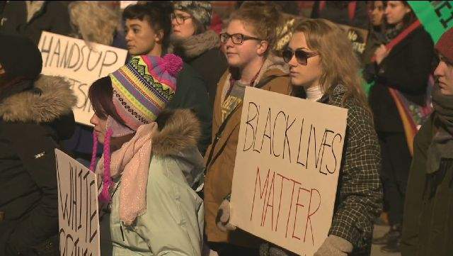 Edmonton protestors demand justice for Michael Brown following Ferguson grand jury’s decision not to indict the police officer who killed him.