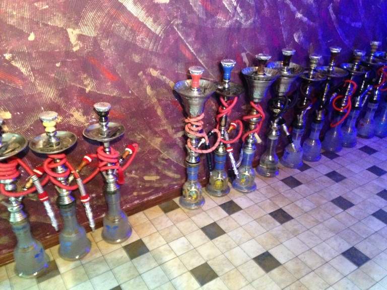 A row of hookah pipes in Aladdin Cafe.