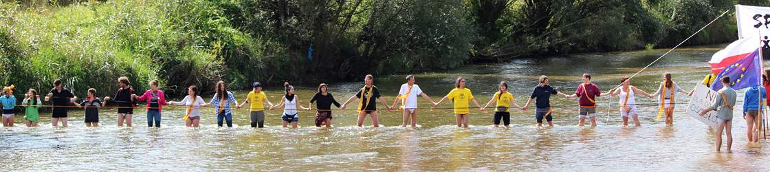 People form a human chain to protest coal mine expansion
