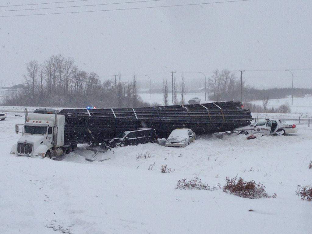 An officer was sent to hospital after this semi lost control on Highway 2 near Red Deer.