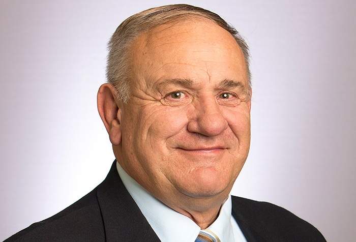 Conservative candidate Jim Eglinski runs under the Conservative banner in the Yellowhead byelection Monday. 