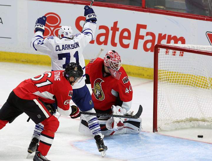 Toronto Maple Leaf David Clarkson celebrates his goal as Ottawa Senator goaltender Robin Lehner (40) looks back to see the puck in his net as teammate Mark Stone (61)looks on during third period NHL hockey between the Ottawa Senators and the Toronto Maple leafs in Ottawa Sunday November 9, 2014. The Maple Leafs defeated Ottawa 5-3.