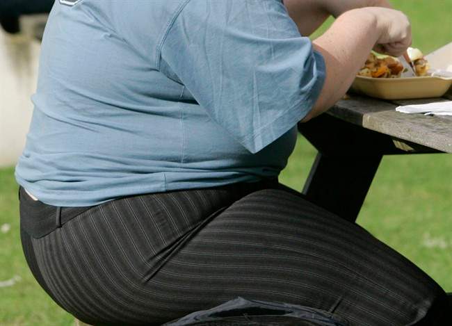 Obesity in midlife has long been suspected of increasing the risk of Alzheimer's. Researchers at the National Institutes of Health took a closer look and reported Tuesday that being overweight or obese at age 50 may affect the age, years later, when Alzheimer's strikes.