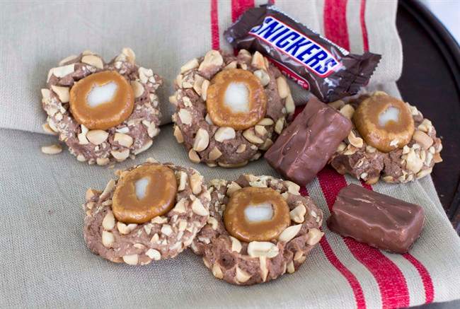 This Oct. 20, 2014 photo shows caramel peanut thumbprints in Concord, N.H. When it comes to holiday cookies, everything depends on the recipe and a few simple techniques.